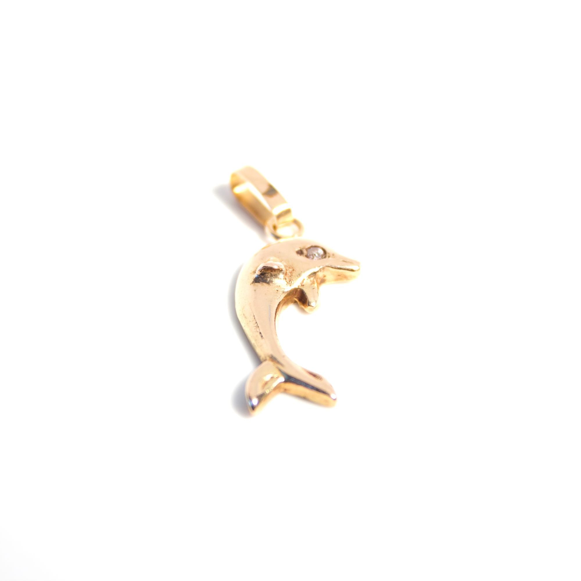 Delfín oro rosa
