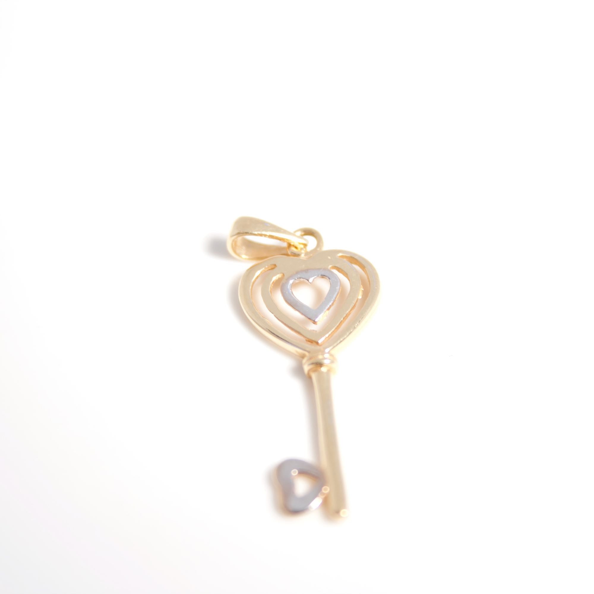 Llave con corazon Oro bicolor