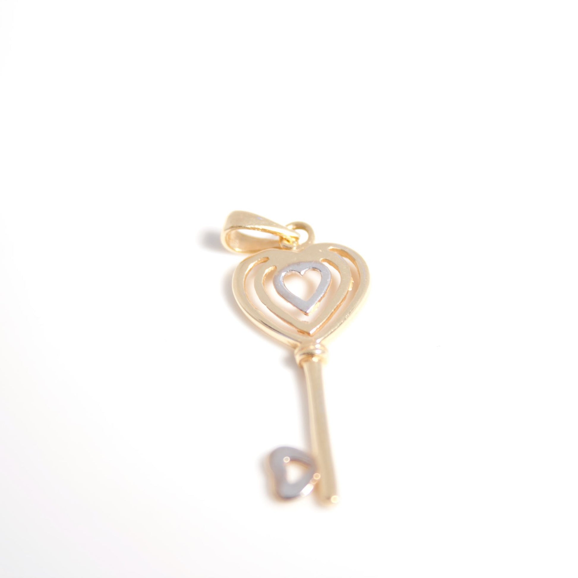 Llave con corazon Oro bicolor