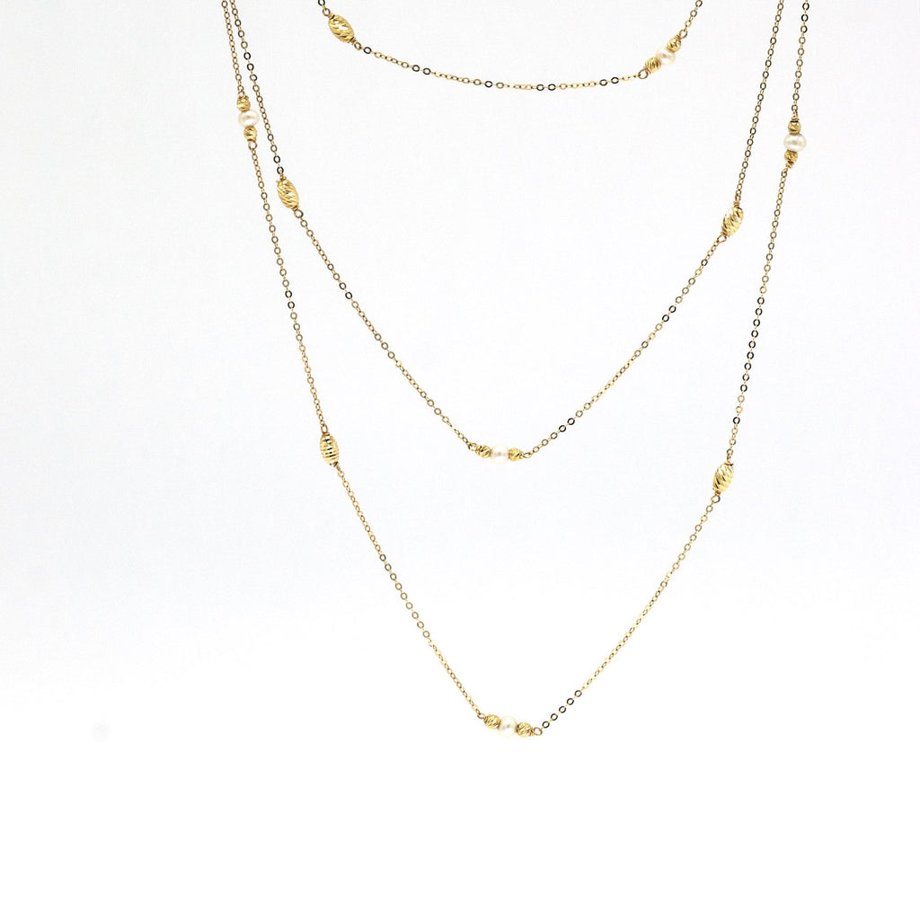 Colgante triple perlas oro amarillo